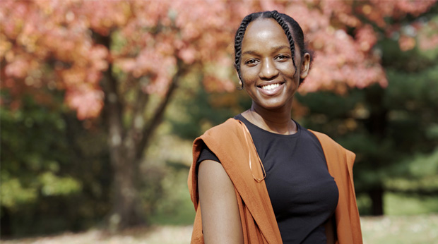 La Roche University student Dania Ngabire standing outside on campus.